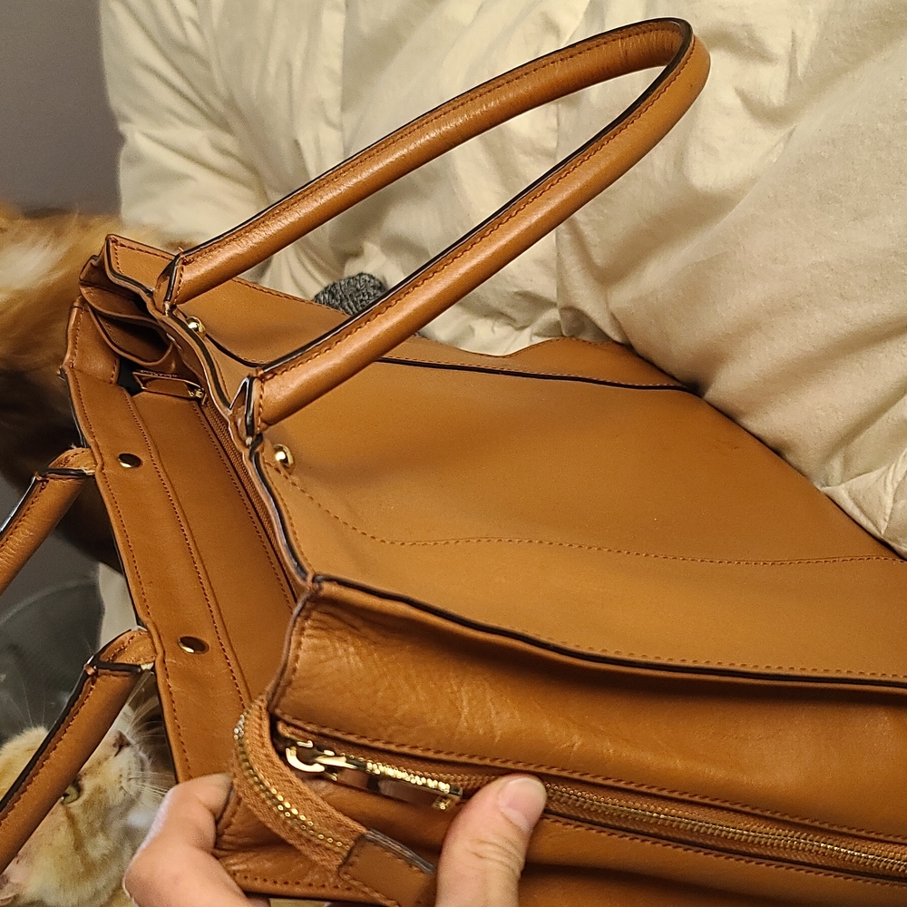 Rebeccaminkoff designer Purse butterfly lining with Gold Hardware.